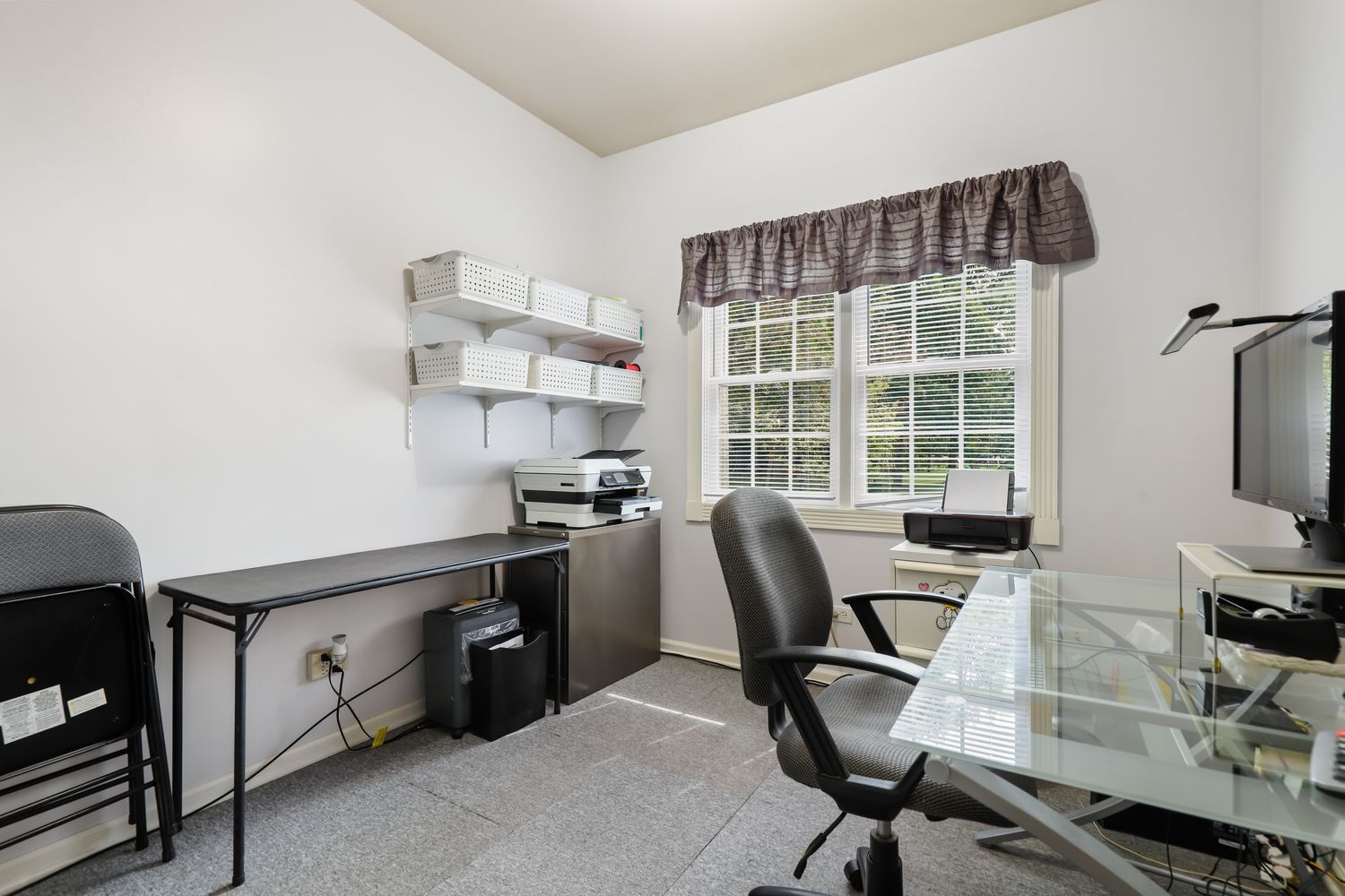 3048 Brampton Lane Dyer, IN 46311 - Photo 21 of 46 a view of a workspace with furniture and a window