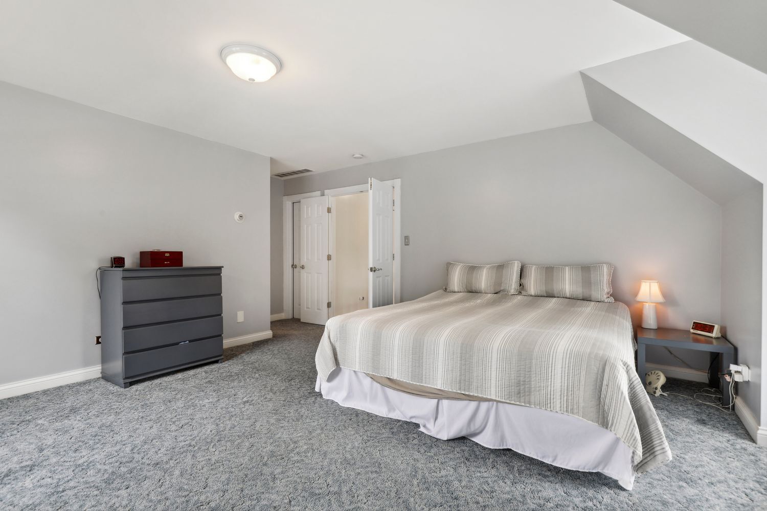 3048 Brampton Lane Dyer, IN 46311 - Photo 24 of 46 a bedroom with a bed and a cabinets