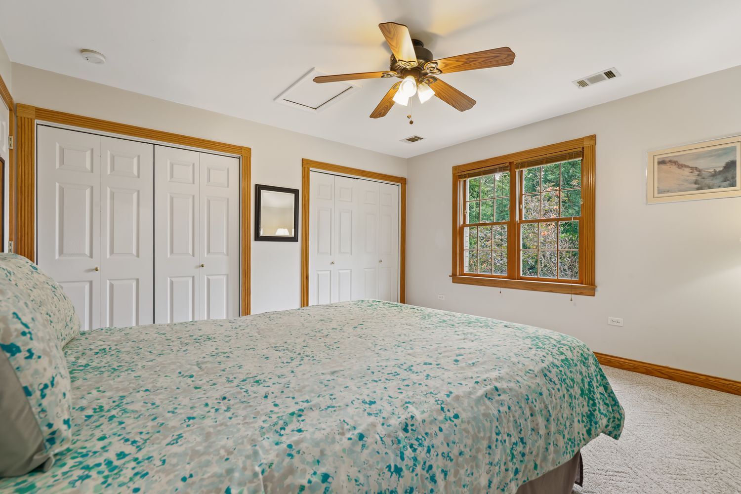 3048 Brampton Lane Dyer, IN 46311 - Photo 32 of 46 a bedroom with a large bed and a window