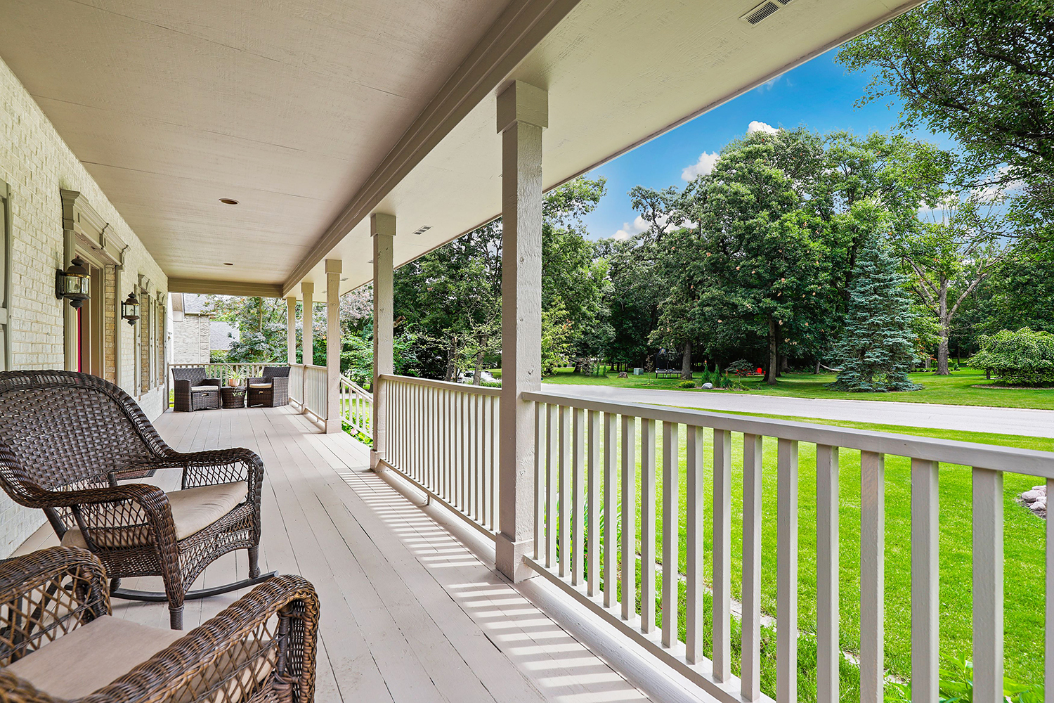 3048 Brampton Lane Dyer, IN 46311 - Photo 8 of 46 a view of balcony with wooden floor and outdoor seating