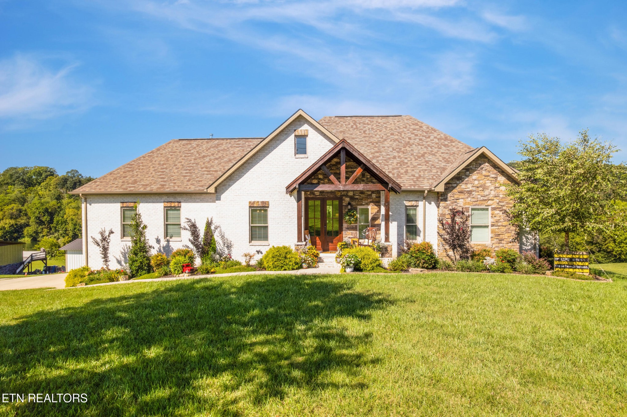 1866 Holston River Drive Rutledge, TN 37861 - Photo 1 of 54 a front view of a house with a yard