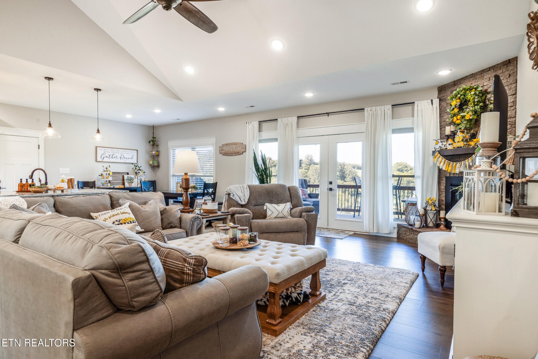 1866 Holston River Drive Rutledge, TN 37861 - Photo 11 of 54 a living room with furniture fireplace and a large window
