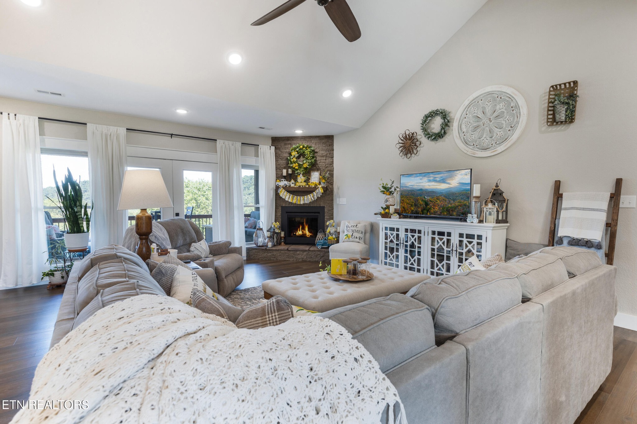 1866 Holston River Drive Rutledge, TN 37861 - Photo 13 of 54 a living room with furniture and a flat screen tv
