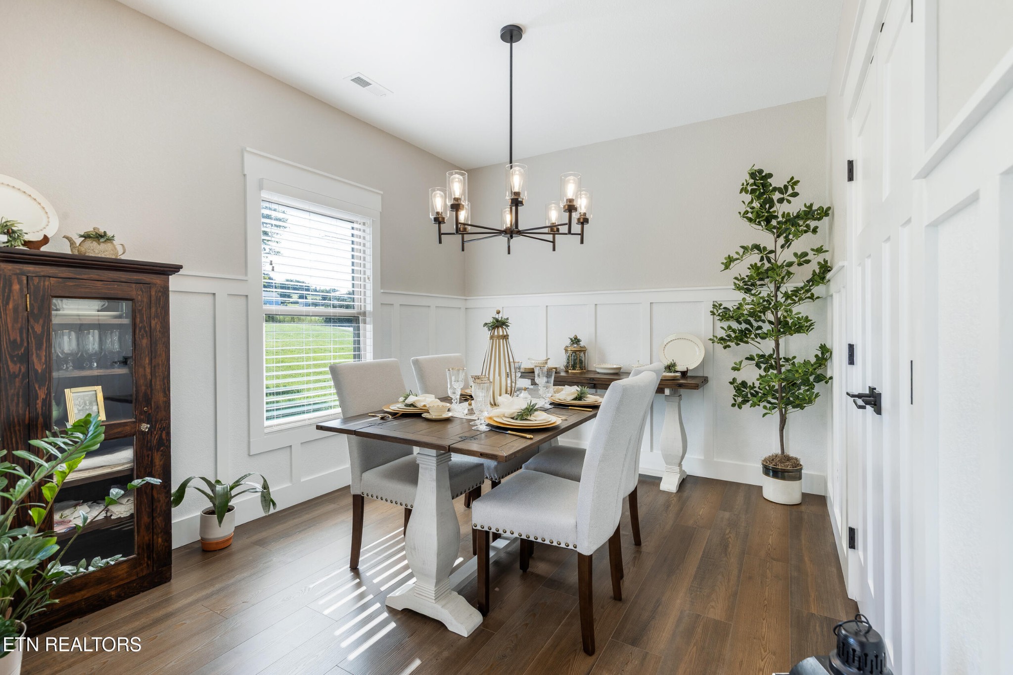 1866 Holston River Drive Rutledge, TN 37861 - Photo 17 of 54 a view of a dining room with furniture window and wooden floor