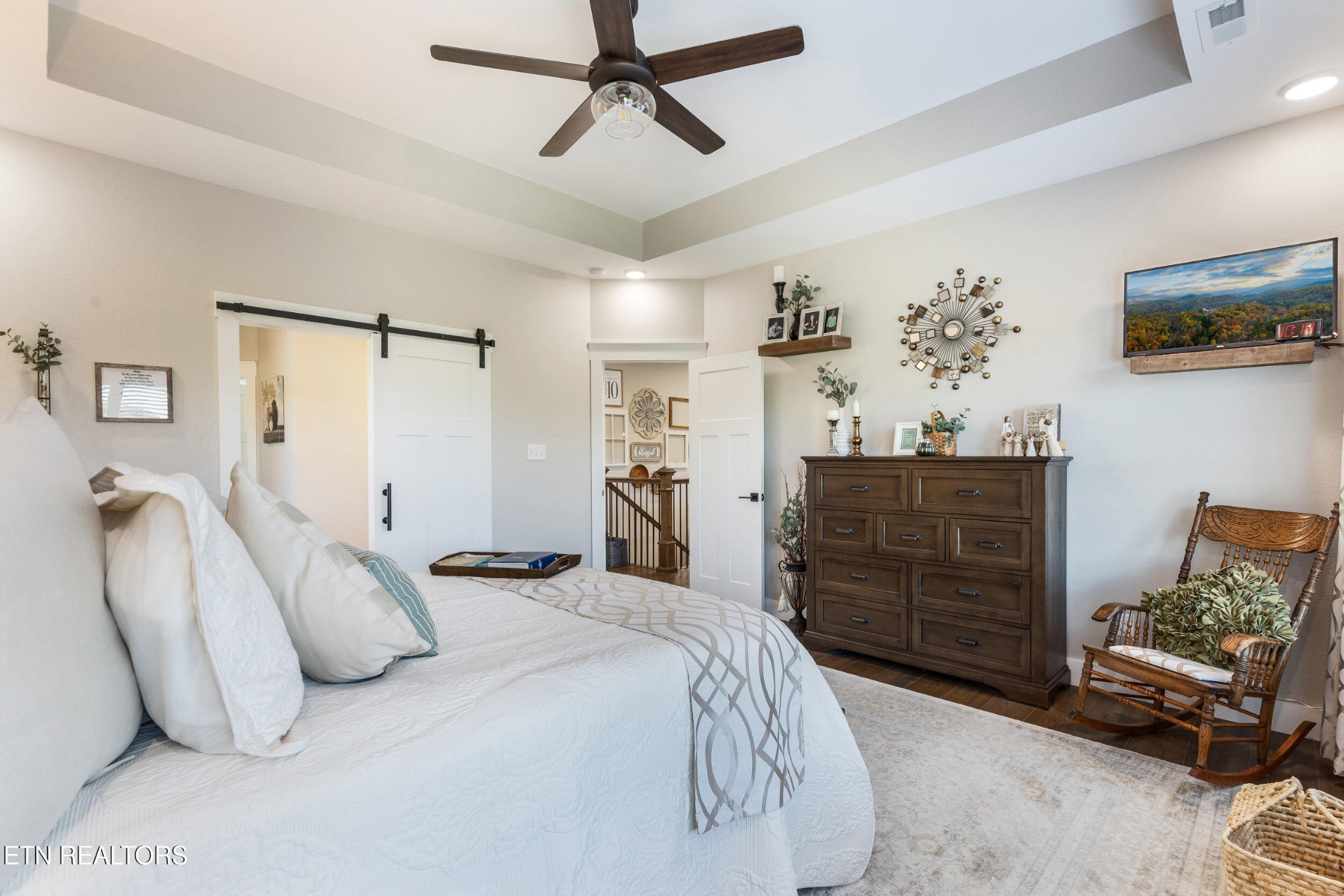 1866 Holston River Drive Rutledge, TN 37861 - Photo 21 of 54 a bedroom with a bed and a dresser