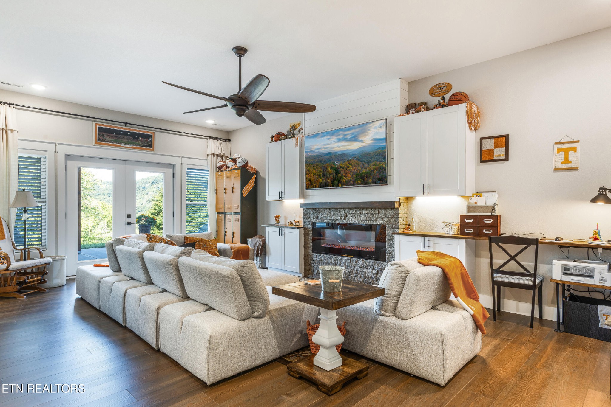 1866 Holston River Drive Rutledge, TN 37861 - Photo 25 of 54 a living room with furniture fireplace and flat screen tv