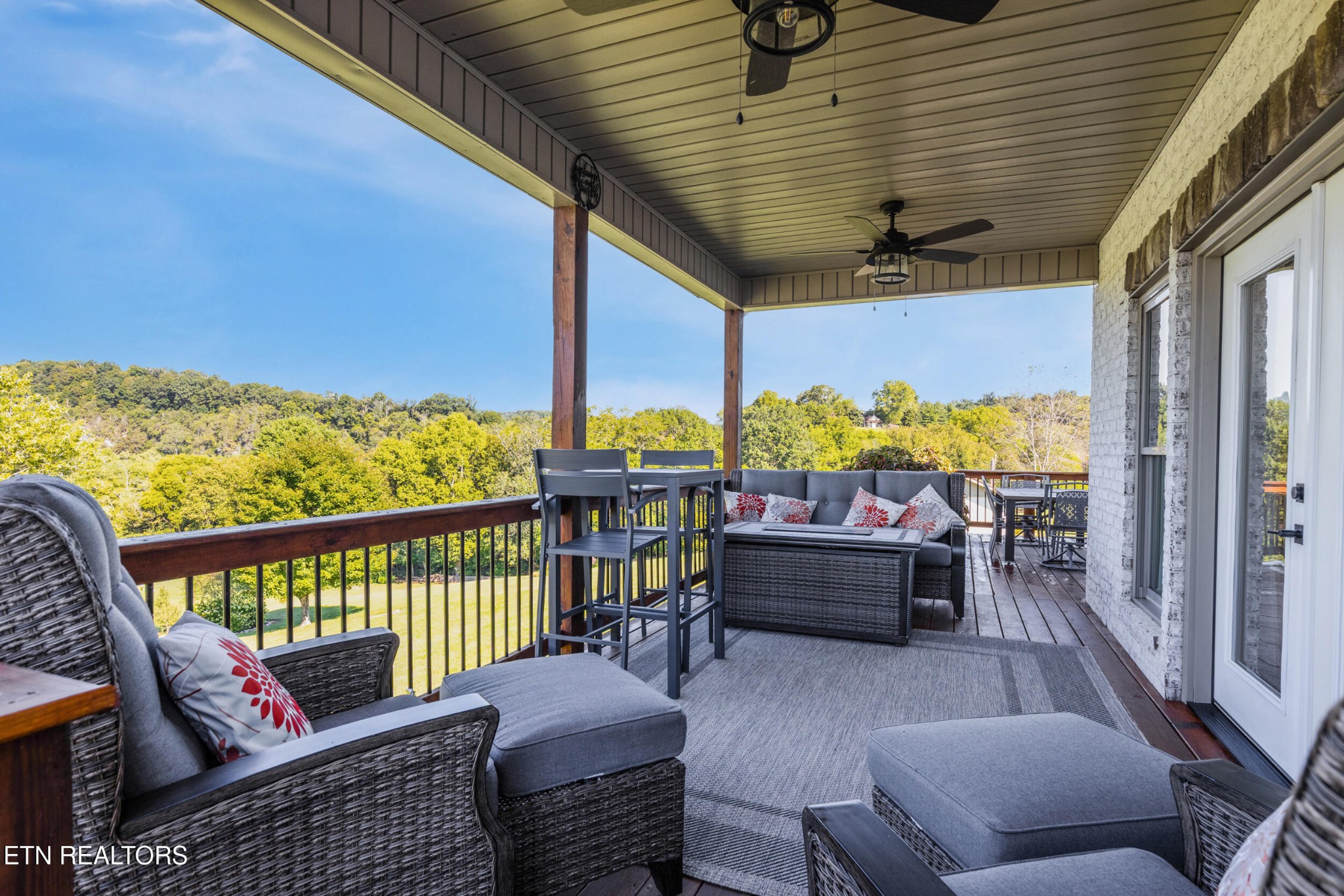 1866 Holston River Drive Rutledge, TN 37861 - Photo 26 of 54 a balcony with furniture and wooden floor