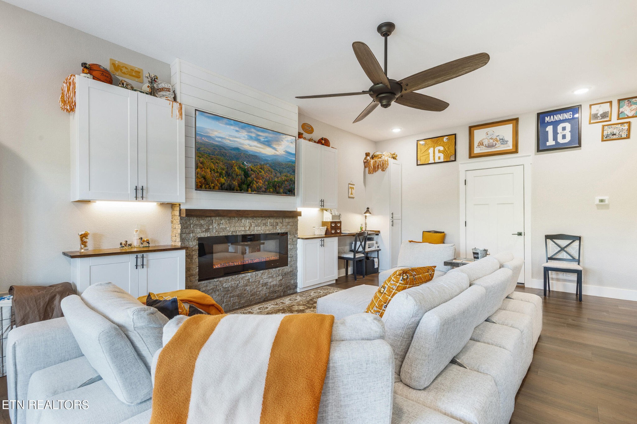 1866 Holston River Drive Rutledge, TN 37861 - Photo 29 of 54 a living room with furniture a fireplace and a flat screen tv