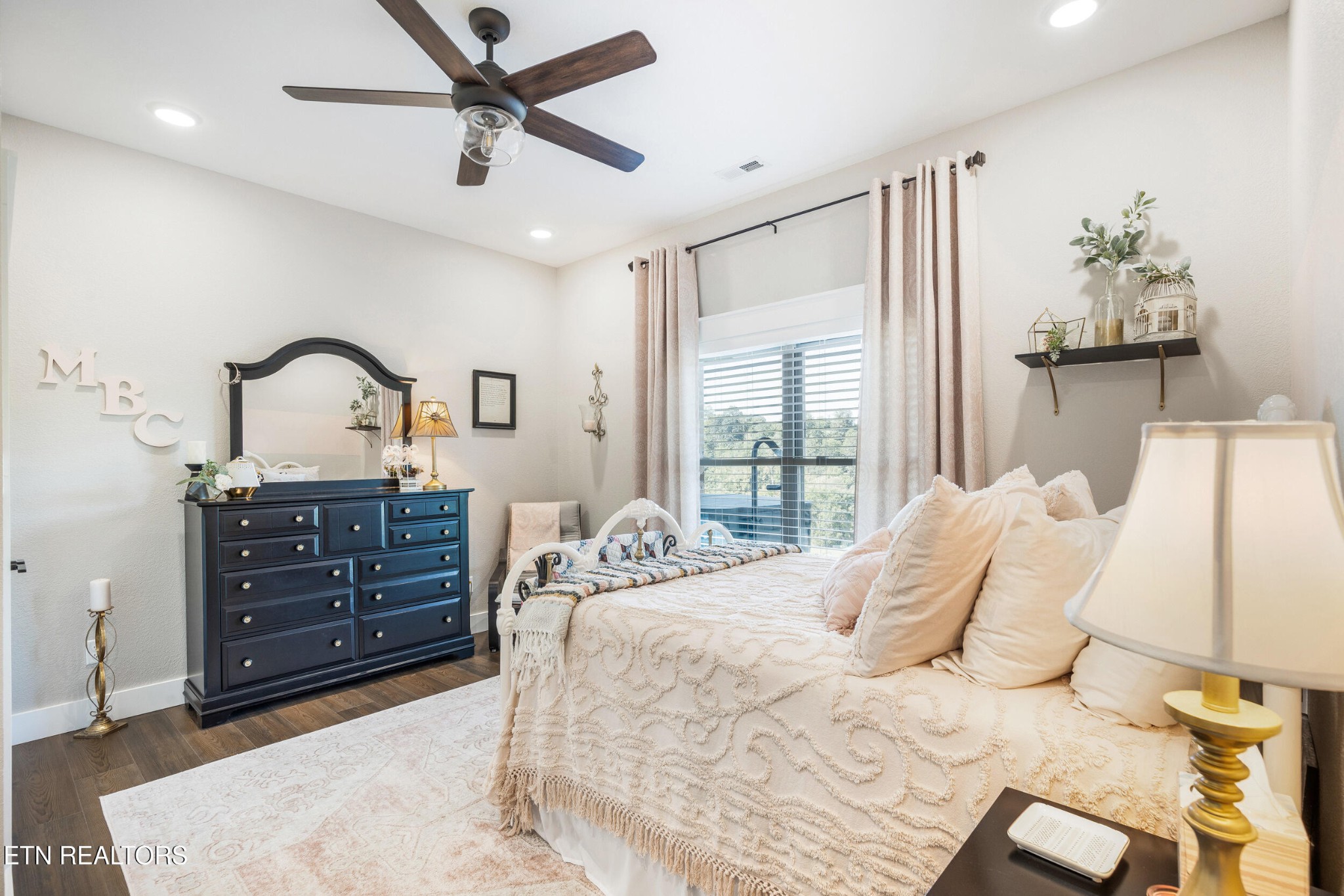 1866 Holston River Drive Rutledge, TN 37861 - Photo 30 of 54 a bed room with a bed and a dresser