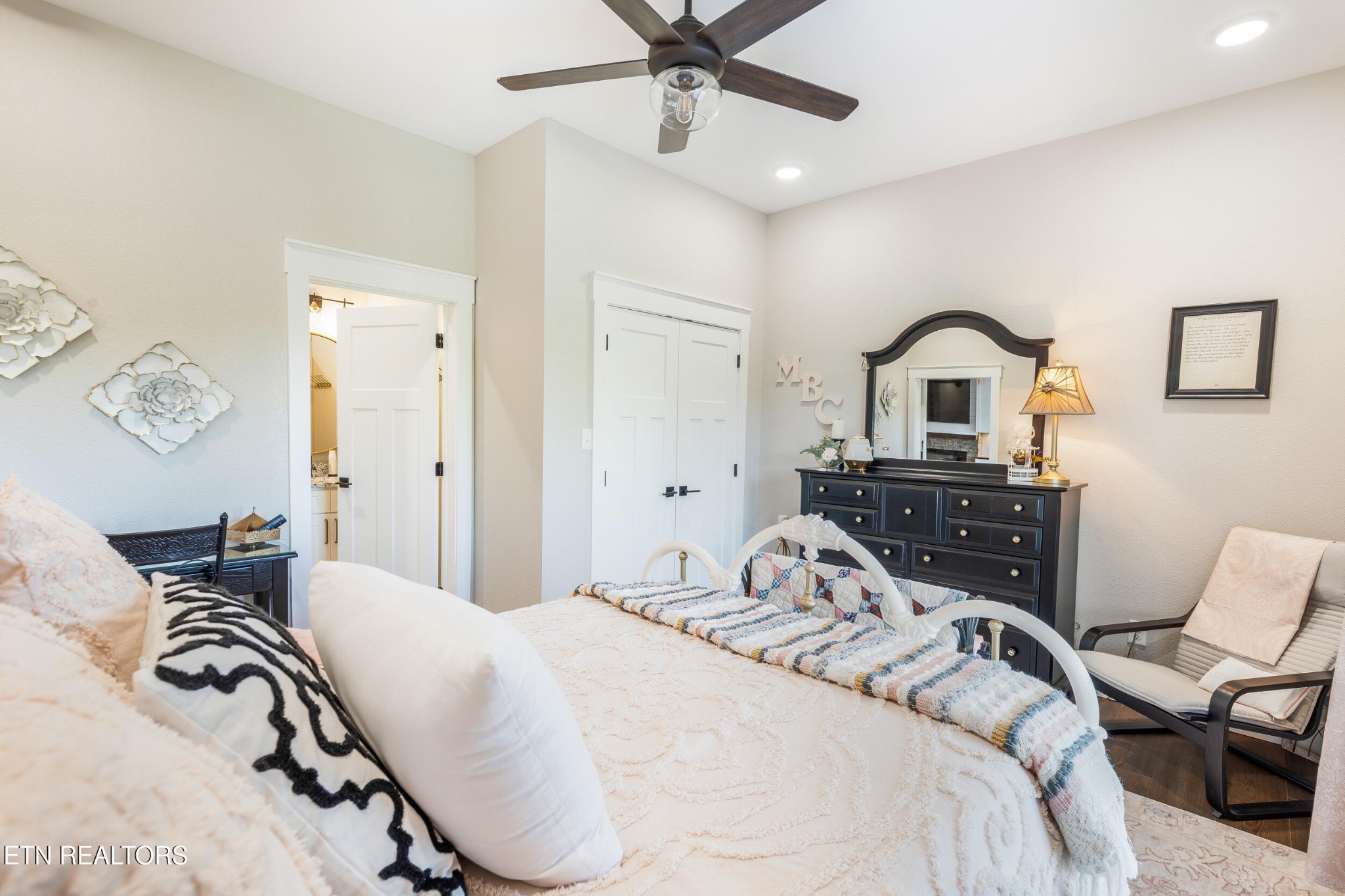 1866 Holston River Drive Rutledge, TN 37861 - Photo 31 of 54 a bedroom with a bed and a chandelier