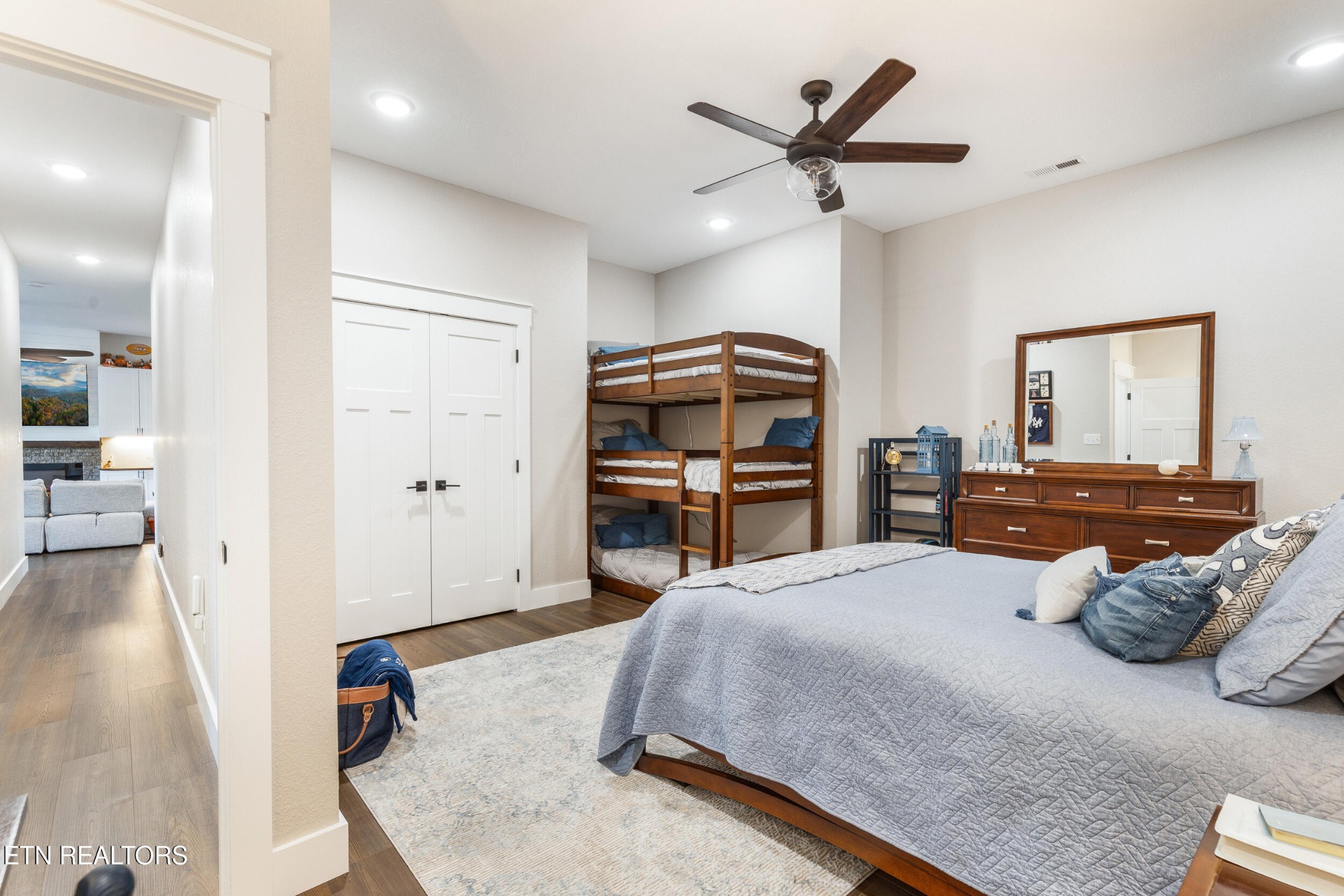 1866 Holston River Drive Rutledge, TN 37861 - Photo 34 of 54 a bedroom with a bed and a large mirror