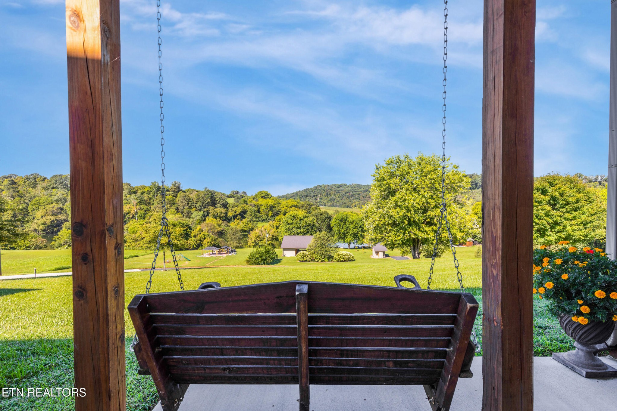 1866 Holston River Drive Rutledge, TN 37861 - Photo 39 of 54 a view of a back yard of the house and a yard