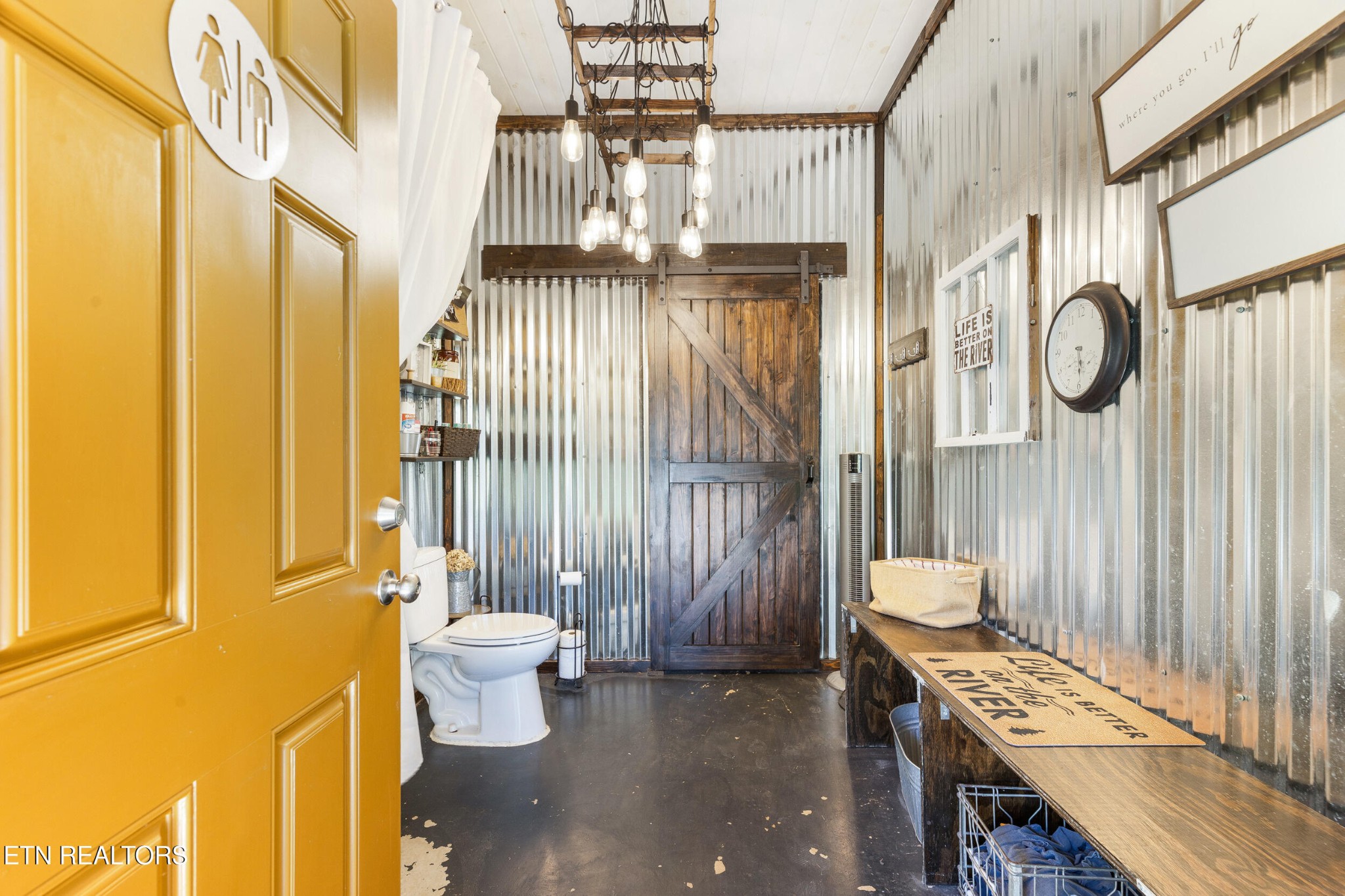 1866 Holston River Drive Rutledge, TN 37861 - Photo 43 of 54 a bathroom with a toilet a sink and a window