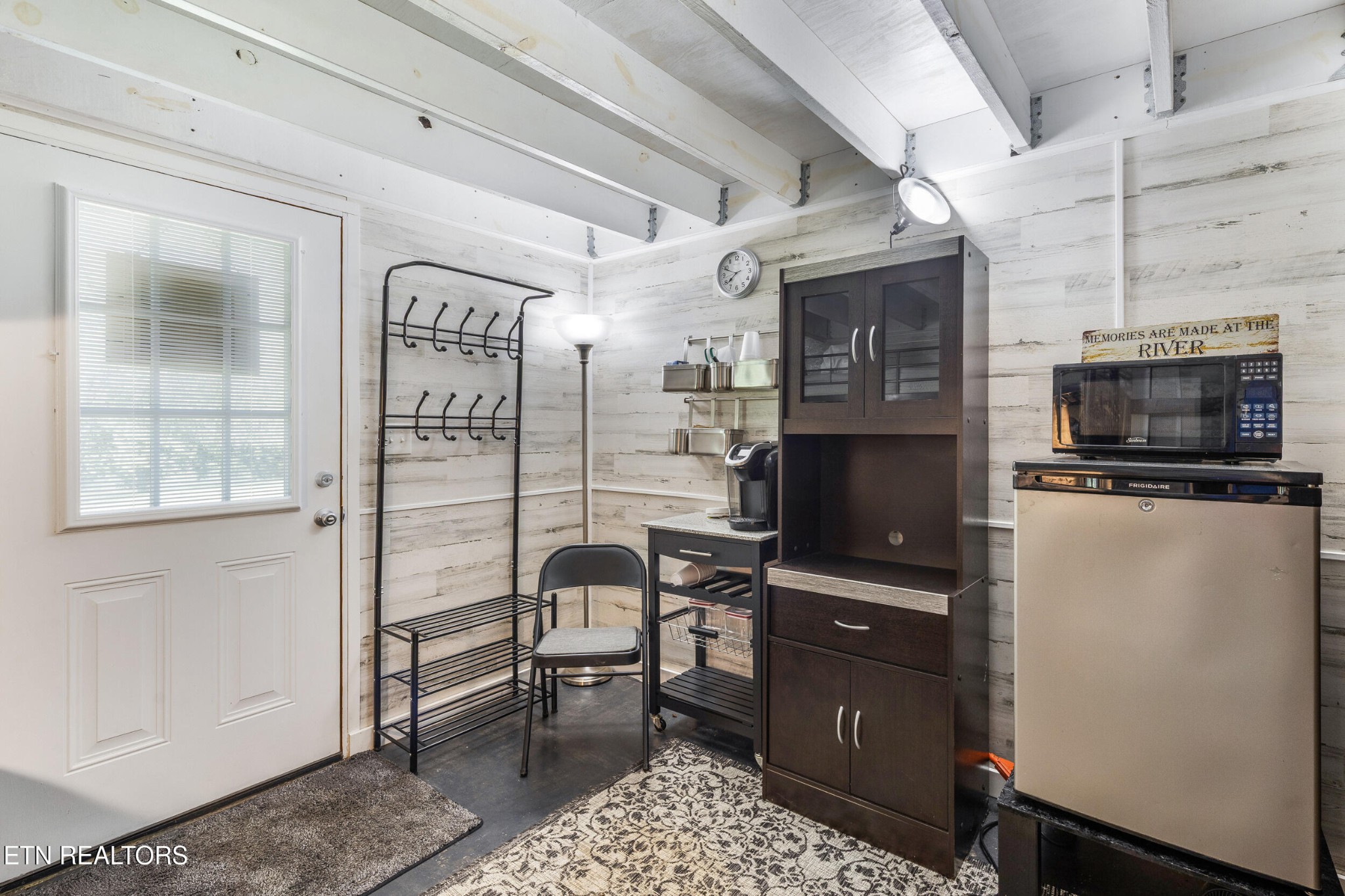 1866 Holston River Drive Rutledge, TN 37861 - Photo 47 of 54 a kitchen with stainless steel appliances kitchen island granite countertop a refrigerator and a stove top oven