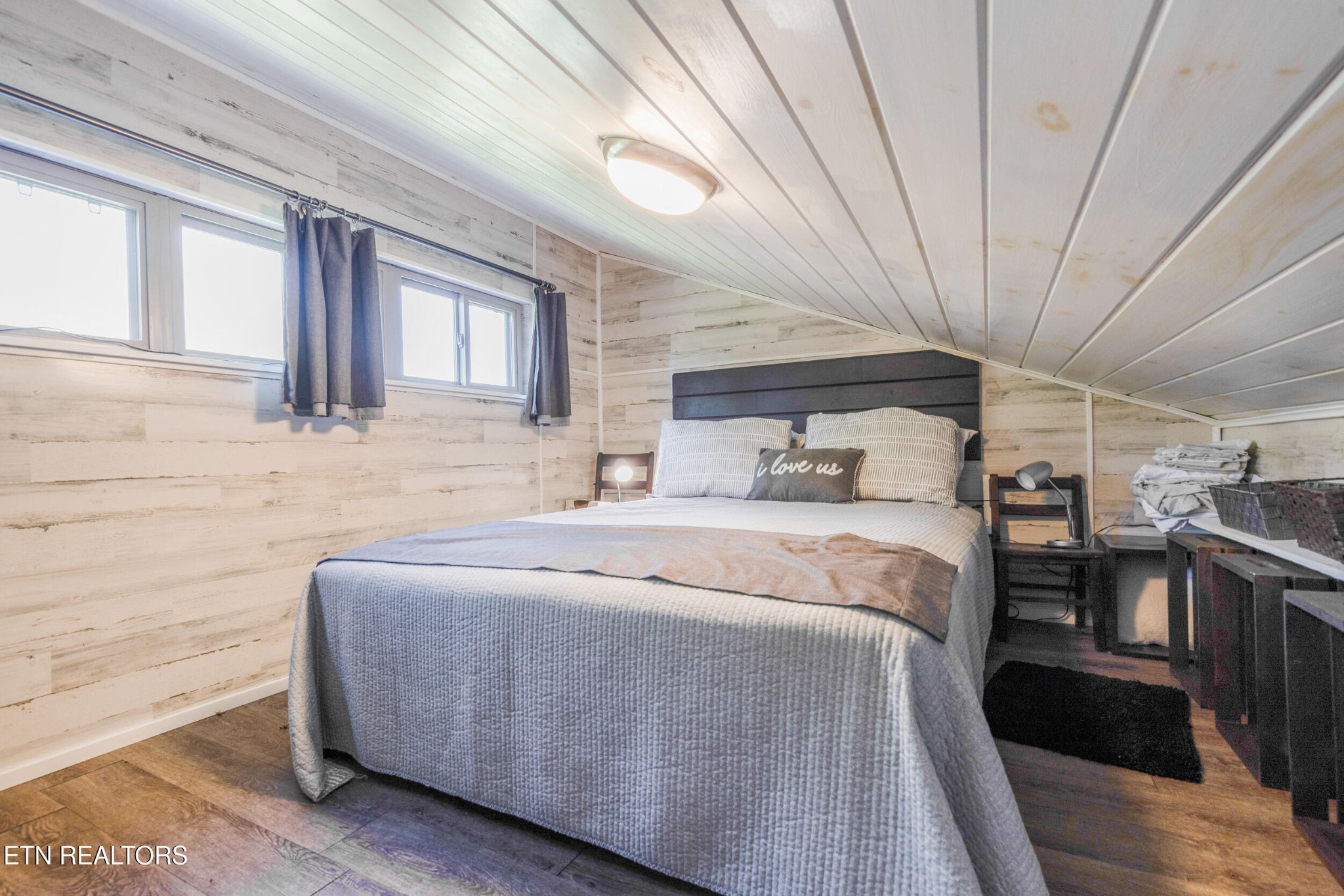 1866 Holston River Drive Rutledge, TN 37861 - Photo 48 of 54 a bedroom with a bed and a large window