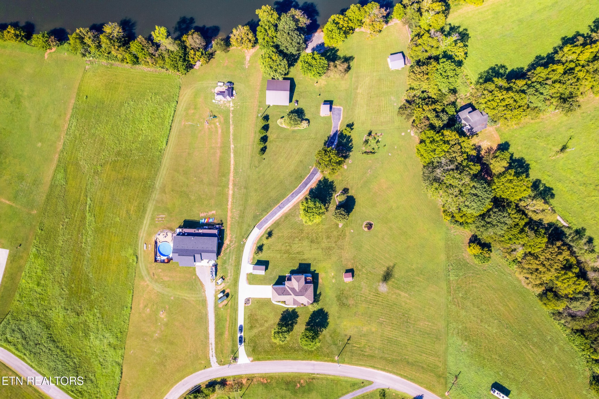 1866 Holston River Drive Rutledge, TN 37861 - Photo 53 of 54 a view of a swimming pool with a garden
