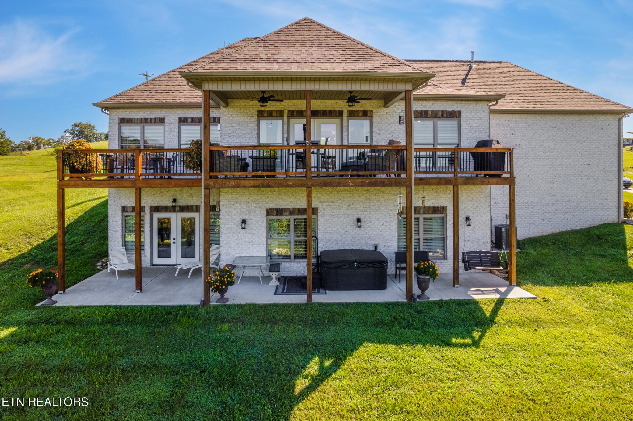 1866 Holston River Drive Rutledge, TN 37861 - Photo 8 of 54 a view of a house with a backyard patio and swimming pool