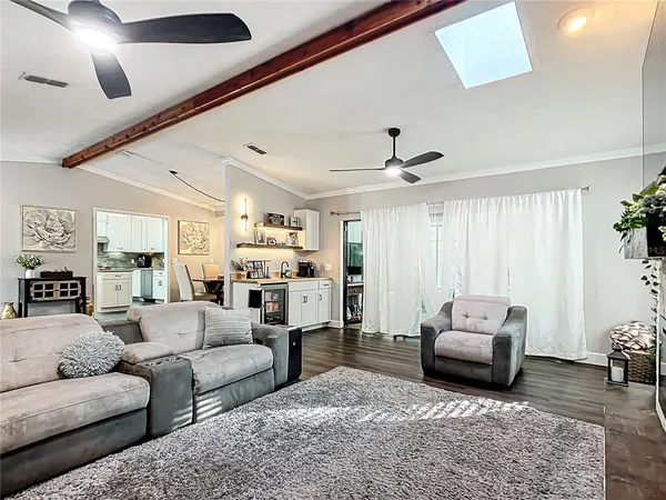 a view of livingroom with furniture and windows
