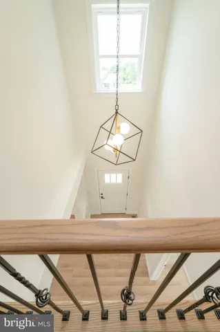 a view of front door with wooden floor