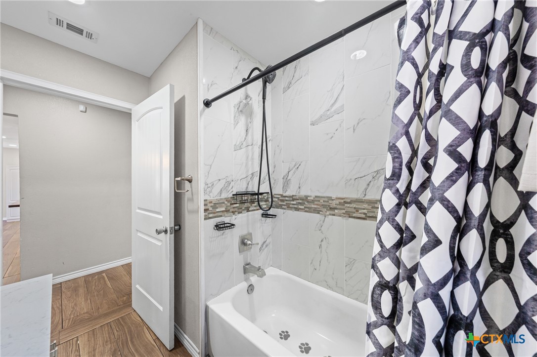 2716 McKenzie Avenue Waco, TX 76708 - Photo 23 of 31 bath and laundry