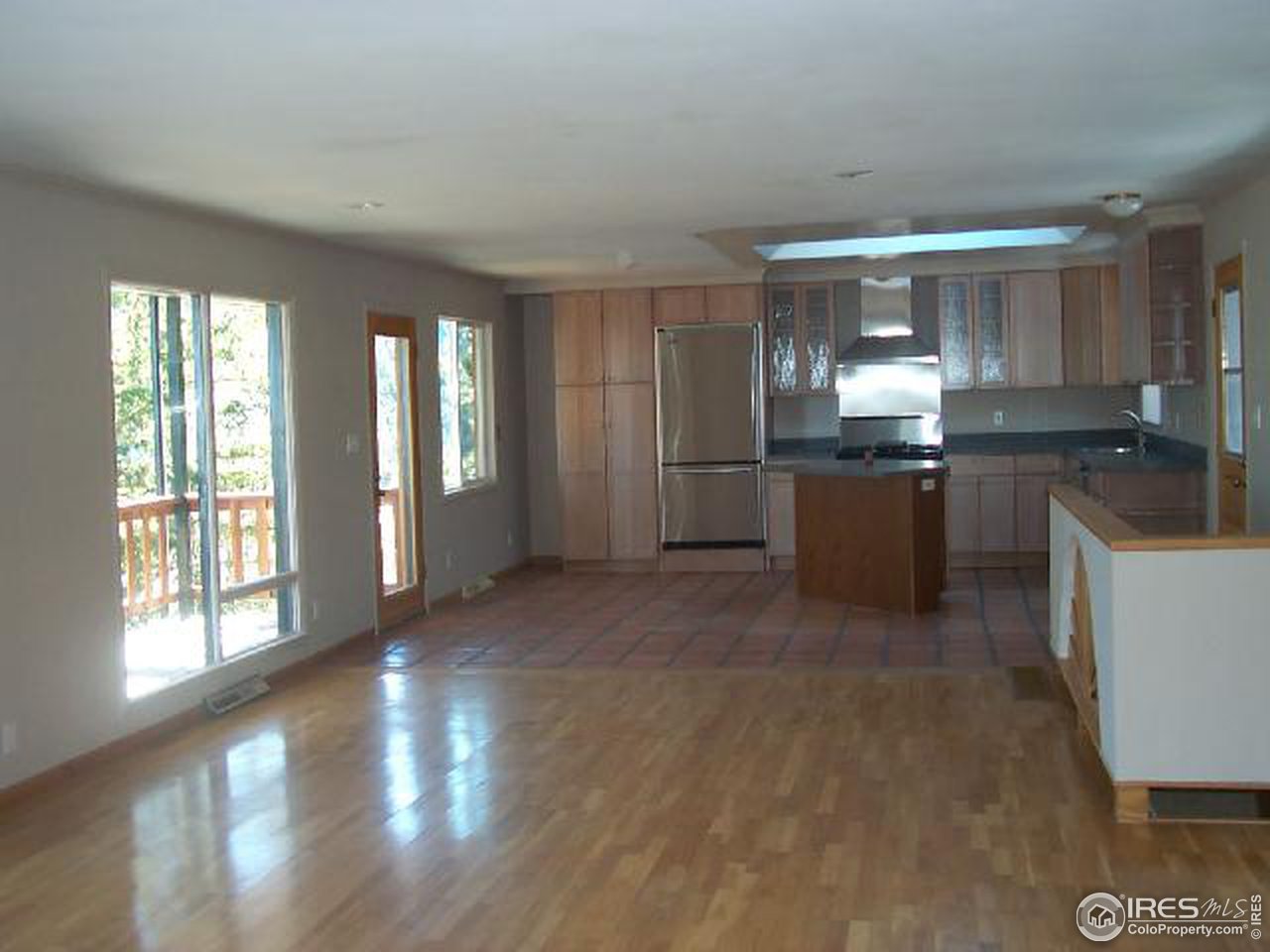 598 Deer Trail Road Boulder, CO 80302 - Photo 3 of 7 a kitchen with stainless steel appliances granite countertop a stove a sink and a refrigerator