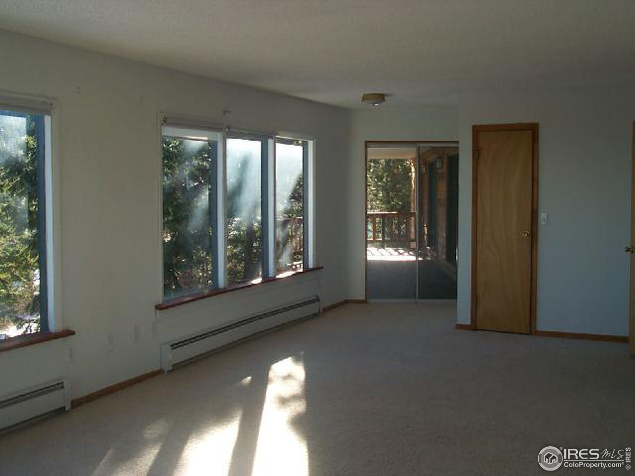 598 Deer Trail Road Boulder, CO 80302 - Photo 5 of 7 a view of an empty room with a window