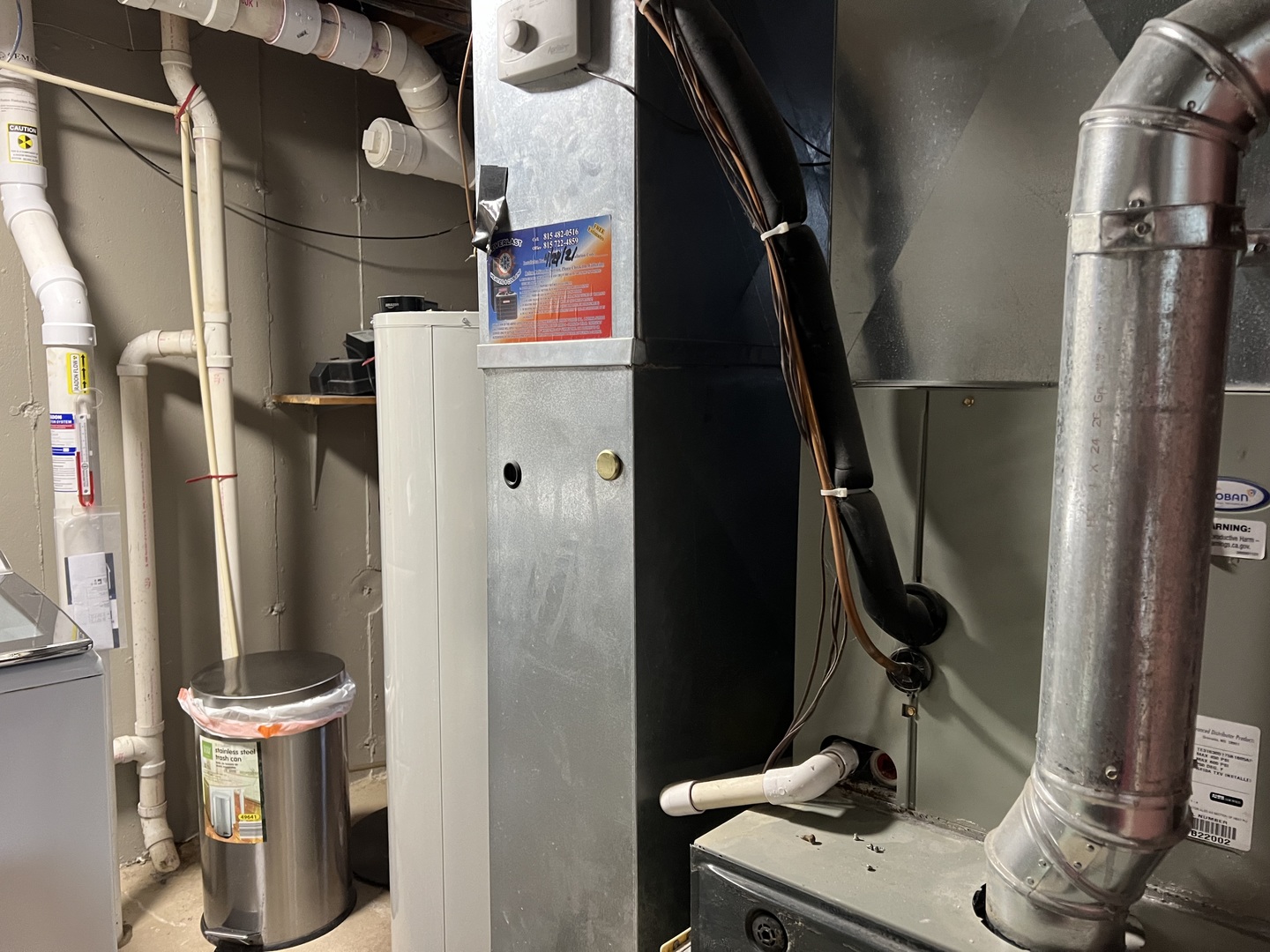 810 Peale Street Joliet, IL 60433 - Photo 15 of 17 a view of walk in closet with clothes and shoes