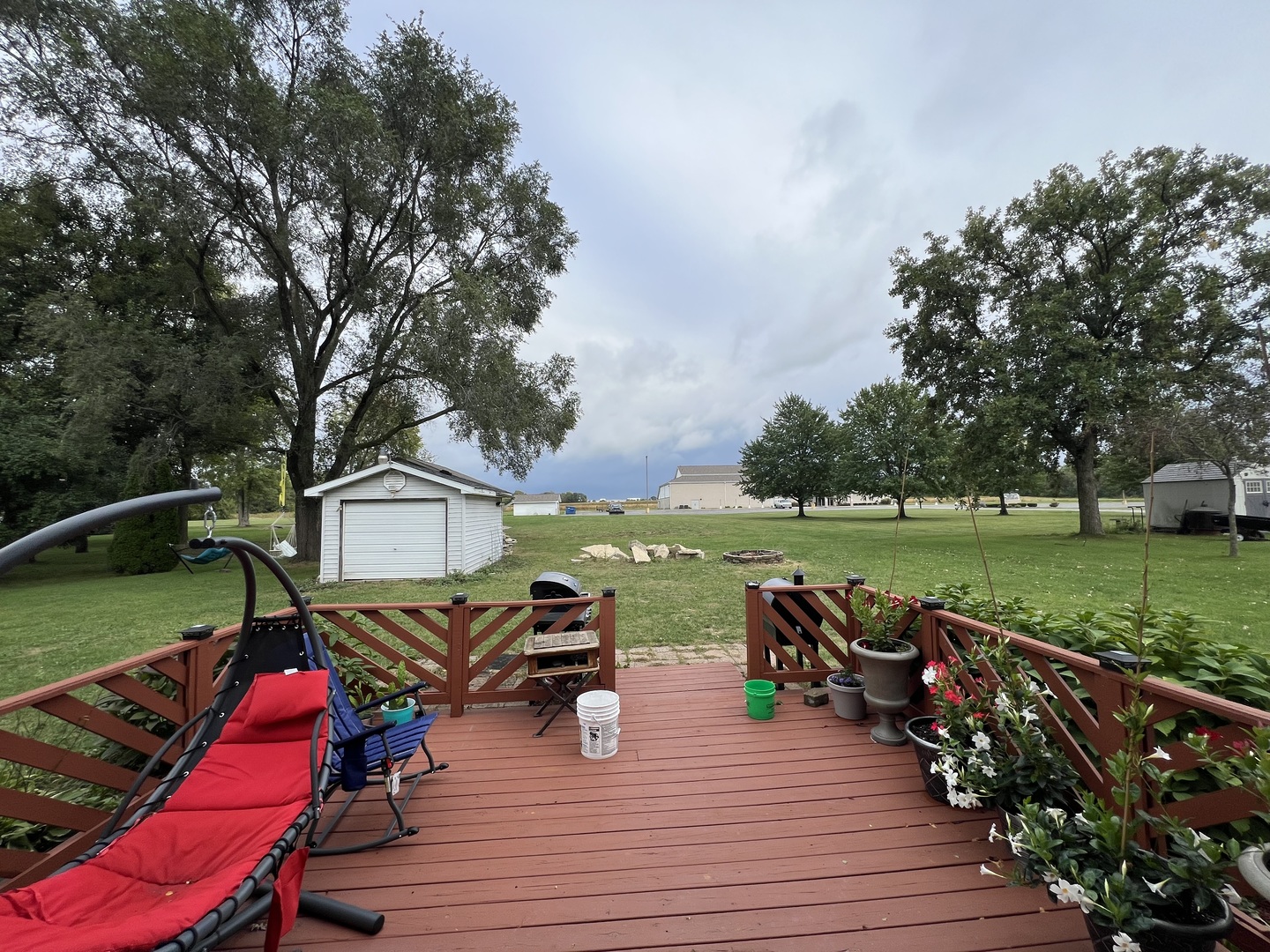 810 Peale Street Joliet, IL 60433 - Photo 17 of 17 an outdoor space with furniture and garden