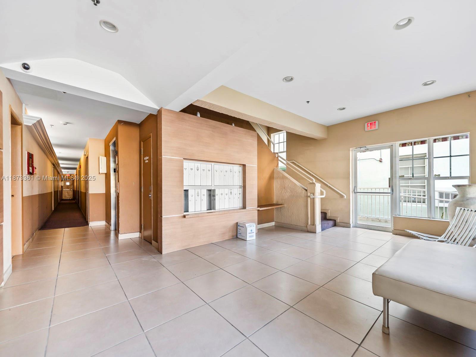 1244 Pennsylvania Avenue, Unit 302 Miami Beach, FL 33139 - Photo 13 of 13 a view of an entryway with a rug