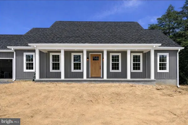 a house with a large window in the background