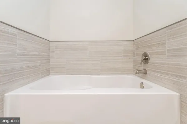 a bathroom with bathtub