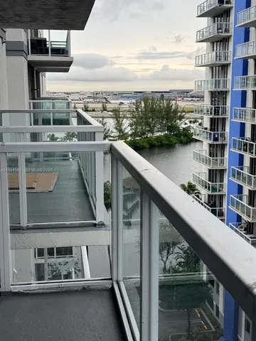 a view of balcony with furniture
