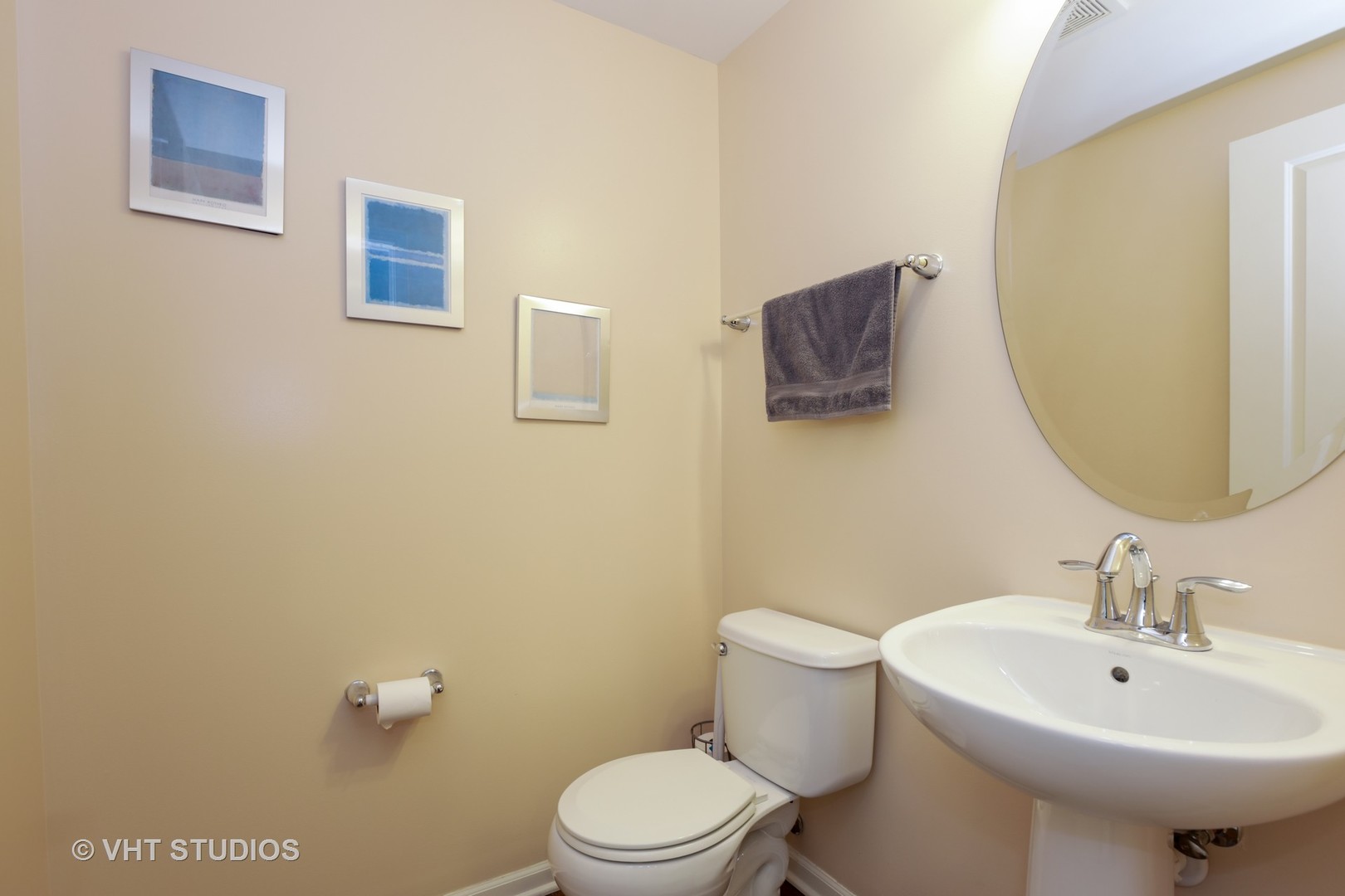 6826 Prairie Street Morton Grove, IL 60053 - Photo 14 of 16 a bathroom with a sink a toilet and mirror