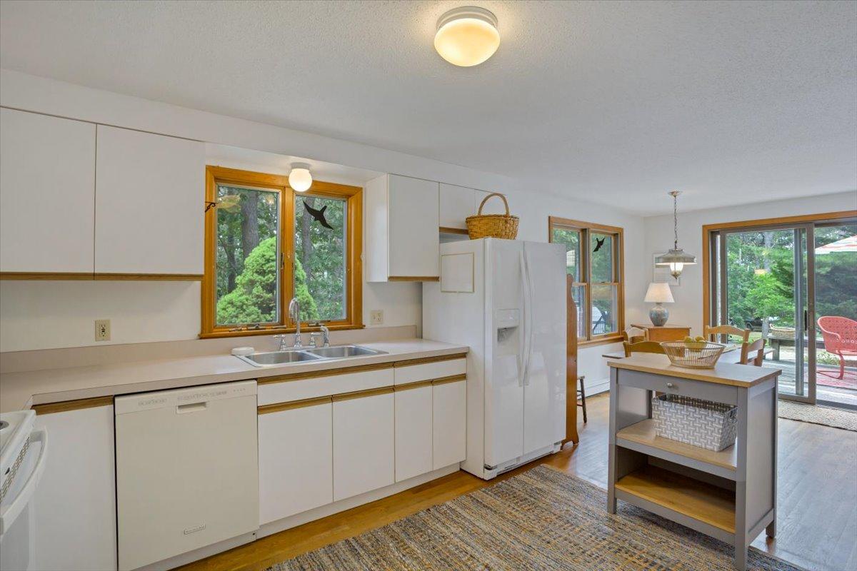 30 Warren Street Wellfleet, MA 02667 - Photo 15 of 47 a kitchen with refrigerator and window