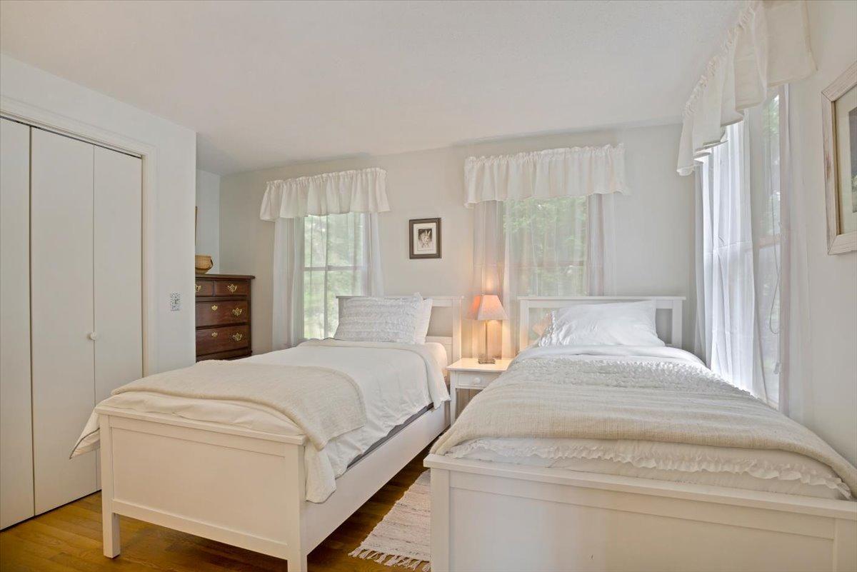 30 Warren Street Wellfleet, MA 02667 - Photo 18 of 47 a bedroom with bed and a closet