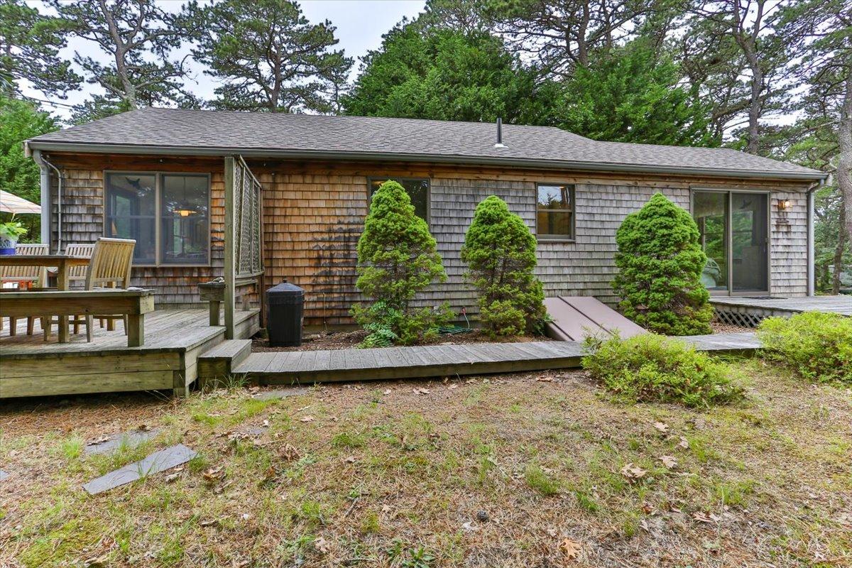 30 Warren Street Wellfleet, MA 02667 - Photo 31 of 47 a front view of a house with garden