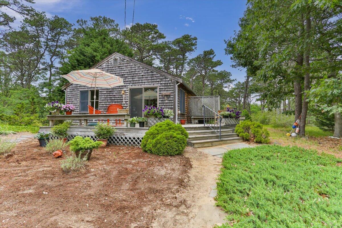 30 Warren Street Wellfleet, MA 02667 - Photo 33 of 47 a front view of a house with garden