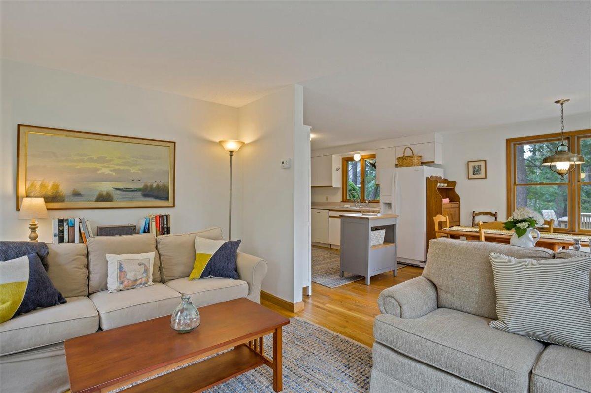 30 Warren Street Wellfleet, MA 02667 - Photo 4 of 47 a living room with furniture and a table