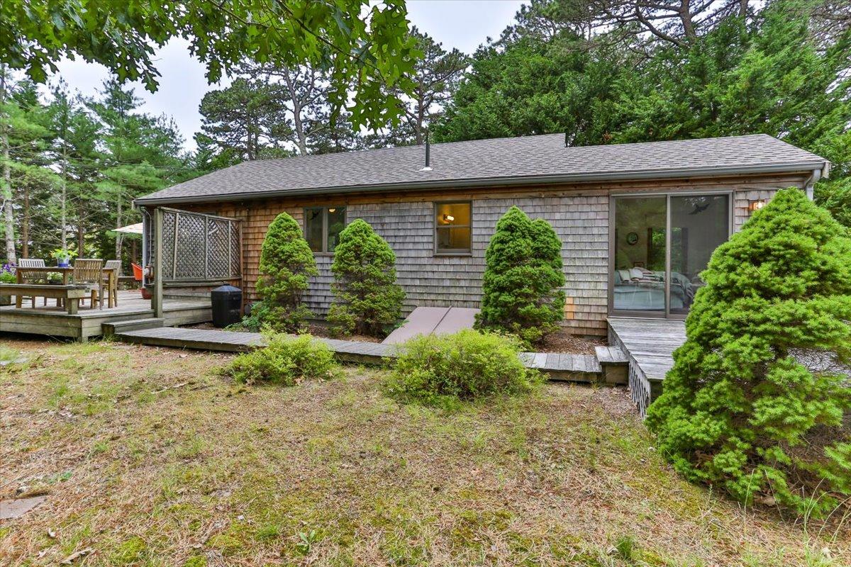 30 Warren Street Wellfleet, MA 02667 - Photo 43 of 47 a front view of a house with garden