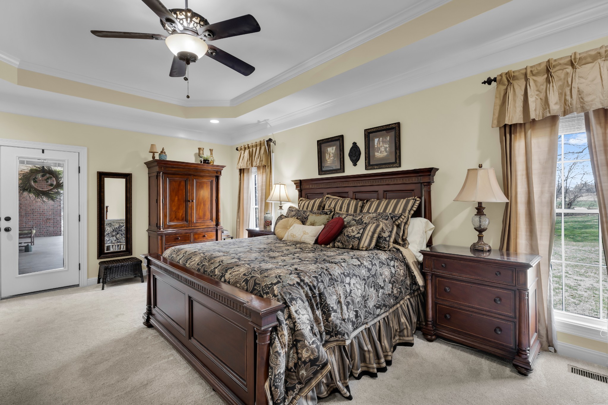 5144 Drake Road Cedar Hill, TN 37032 - Photo 22 of 80 a bedroom with a bed and a chandelier
