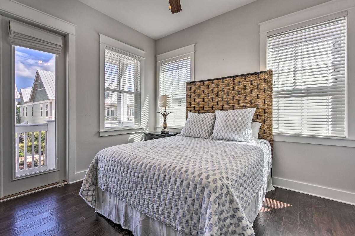 75 York Ln Inlet Beach, Unit C Inlet Beach, FL 32461 - Photo 10 of 22 a bedroom with a bed and window