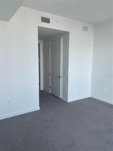 a view of a glass door and a window