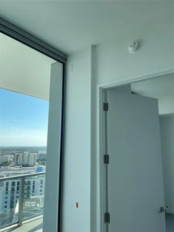 a view of a kitchen with wooden floor