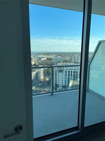 a view of a balcony with city view