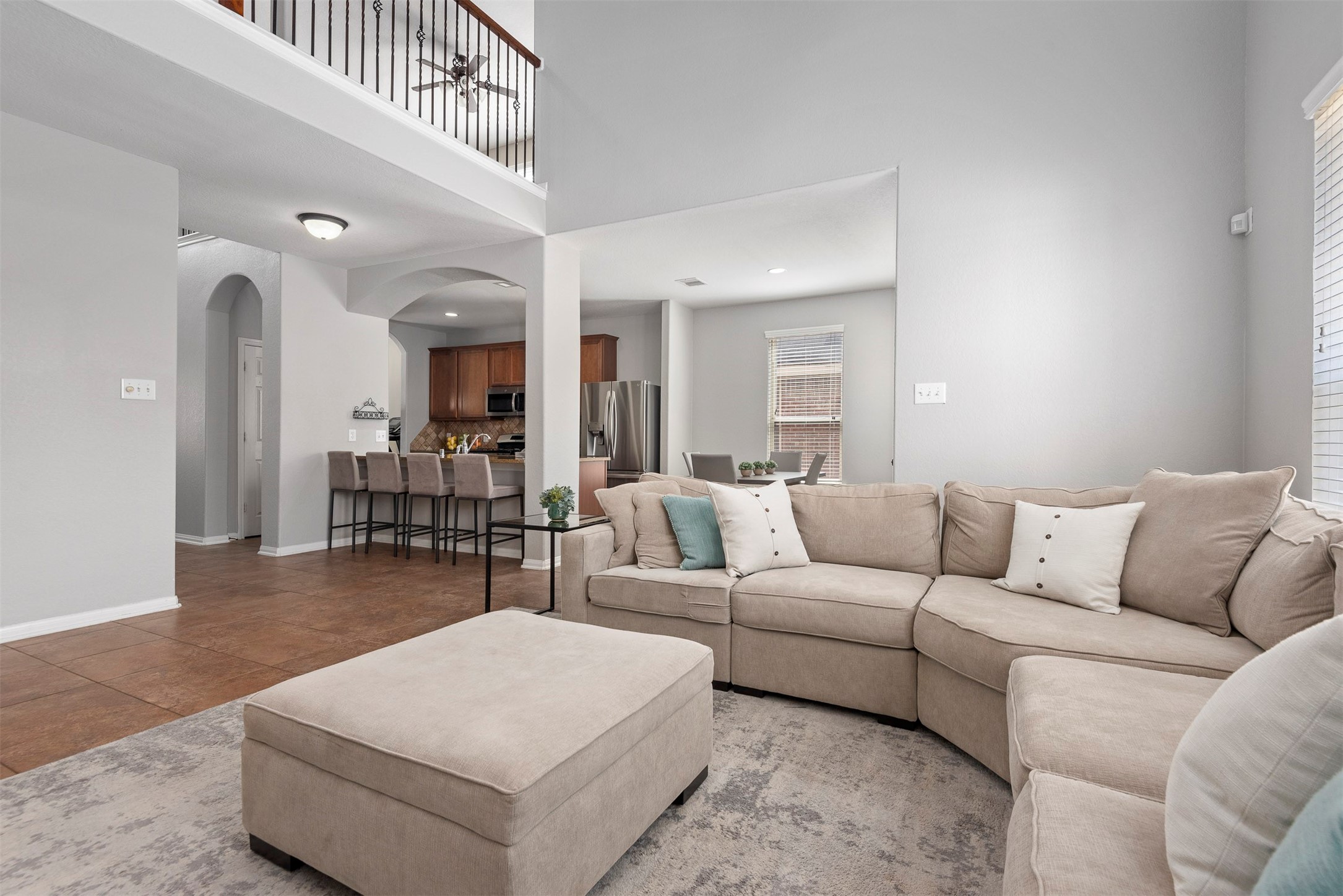 6211 Flagg Ranch Drive Spring, TX 77388 - Photo 21 of 36 Spacious open-concept living area seamlessly connects to the kitchen, perfect for entertaining and everyday living.