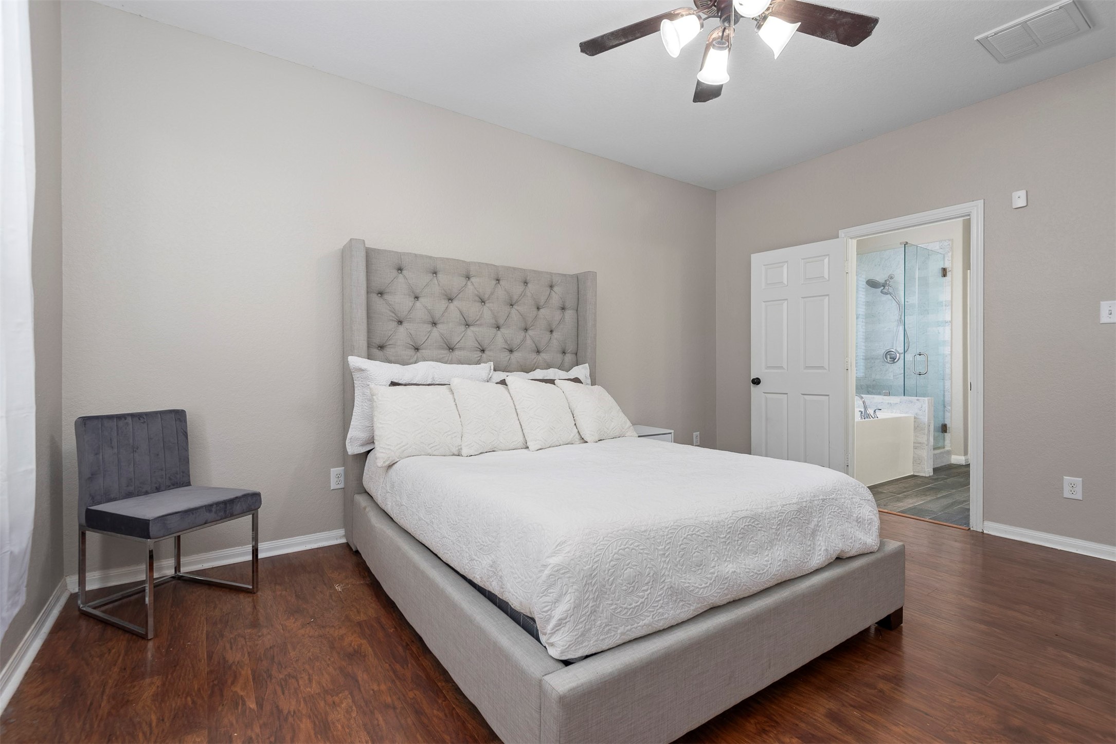 6211 Flagg Ranch Drive Spring, TX 77388 - Photo 24 of 36 Generous primary suite with easy access to the ensuite bath, offering both comfort and functionality.