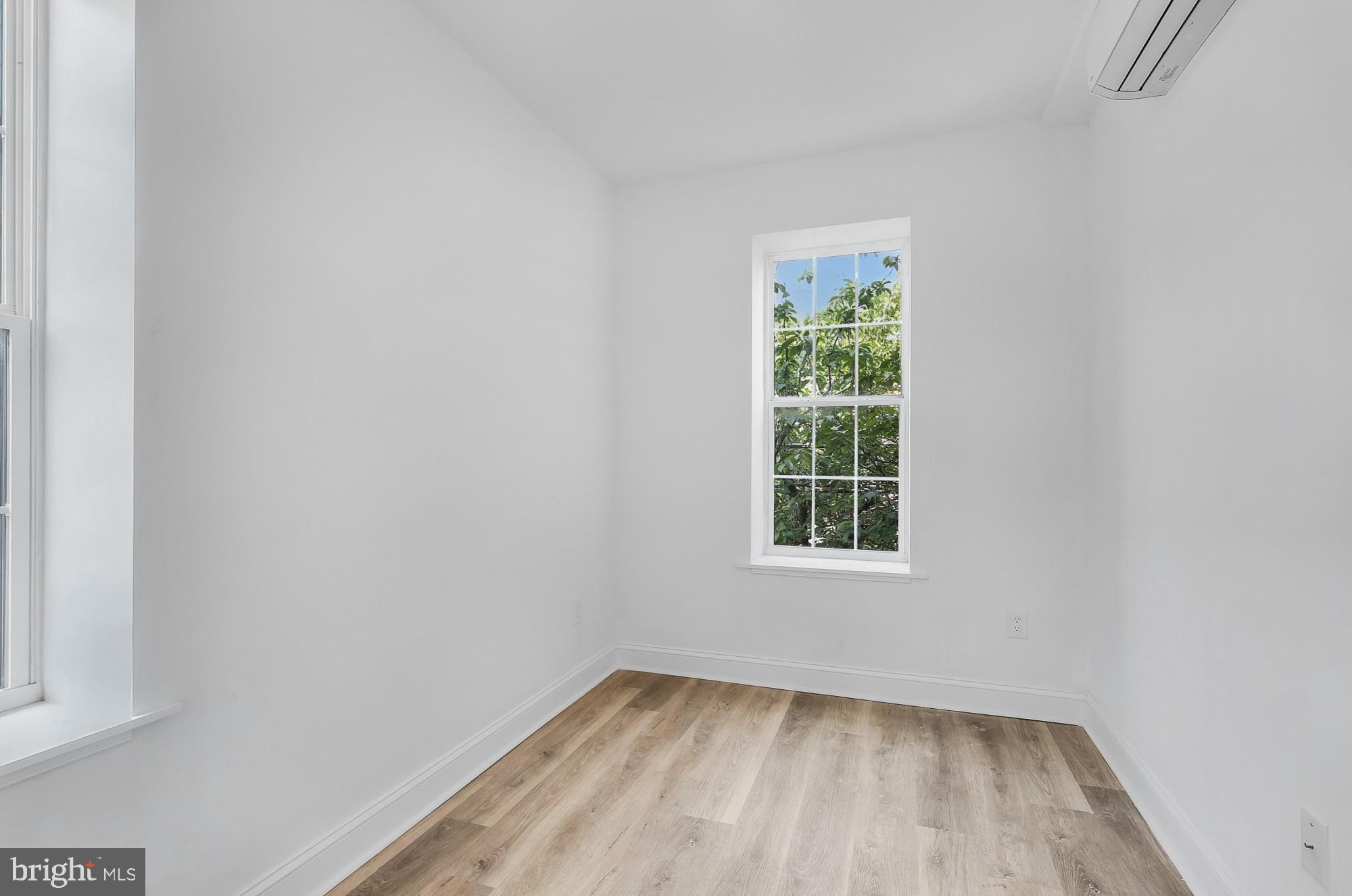 2046 East Huntingdon Street, Unit 2F Philadelphia, PA 19125 - Photo 9 of 15 an empty room with a window