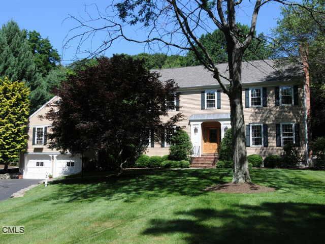 1338 Brookside Drive Fairfield, CT 06824 - Photo 1 of 1 front view of house with a yard