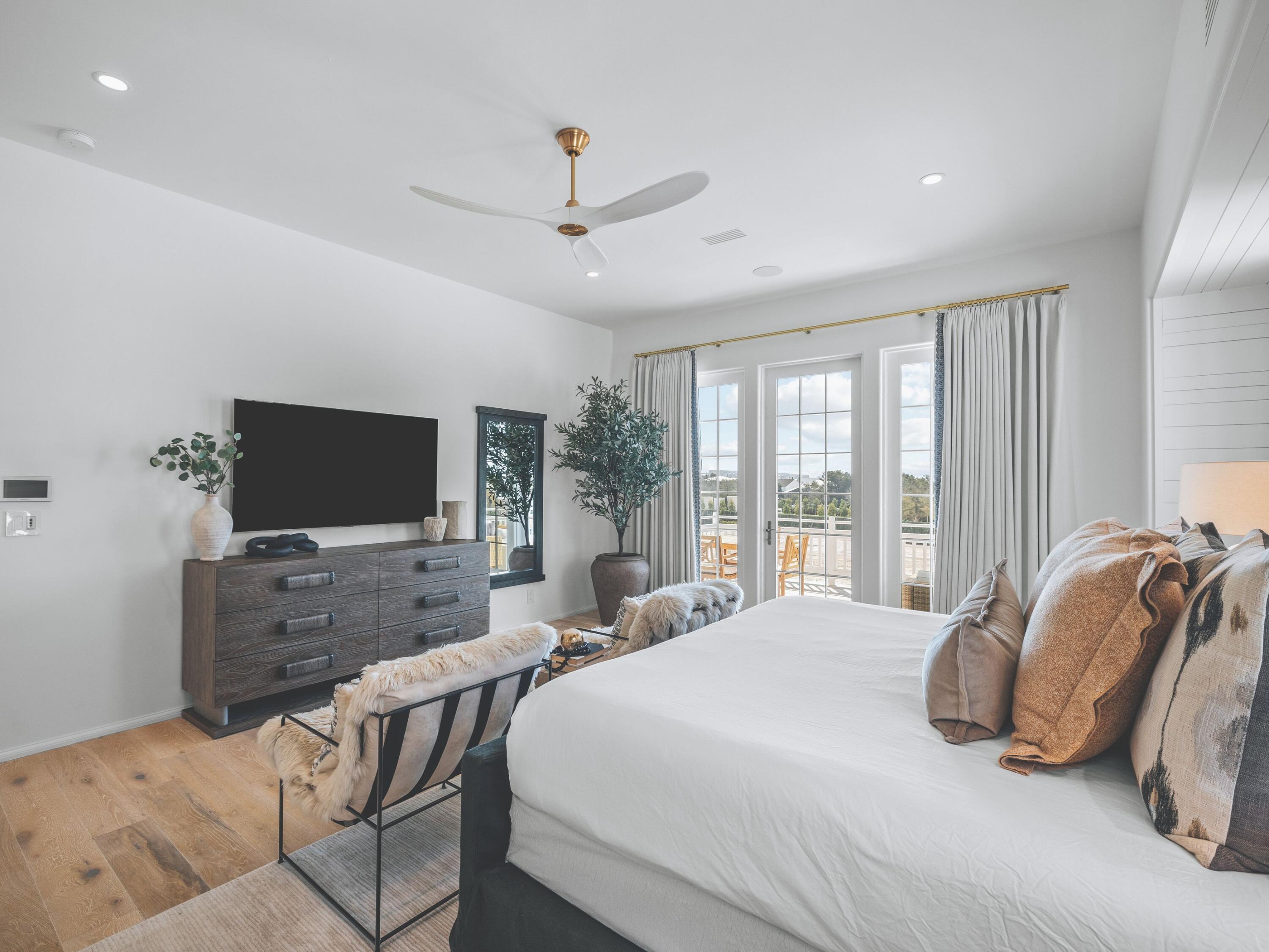 19 Astra Way Inlet Beach, Unit 11 Inlet Beach, FL 32461 - Photo 18 of 42 a bedroom with a bed and a flat screen tv
