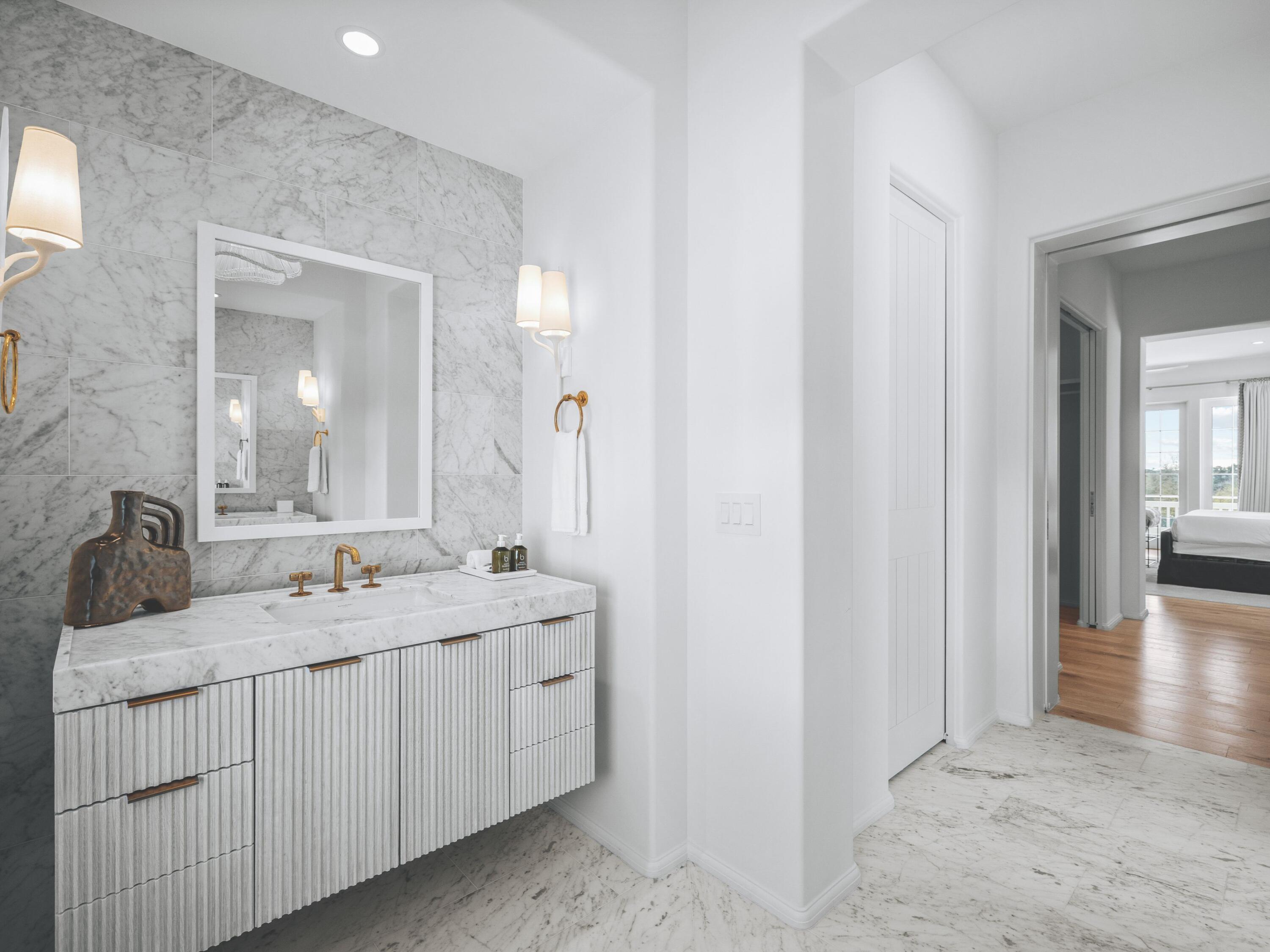 19 Astra Way Inlet Beach, Unit 11 Inlet Beach, FL 32461 - Photo 21 of 42 a bathroom with a double vanity sink and mirror